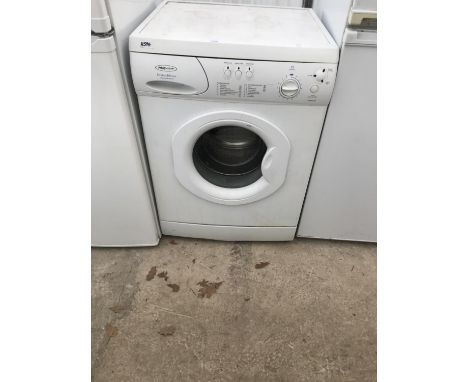 A WHITE HOTPOINT FIRST EDITION WASHING MACHINE BELIEVED IN WORKING ORDER BUT NO WARRANTY 