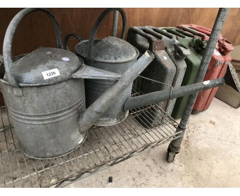 TWO VINTAGE GALVANISED WATERING CANS 