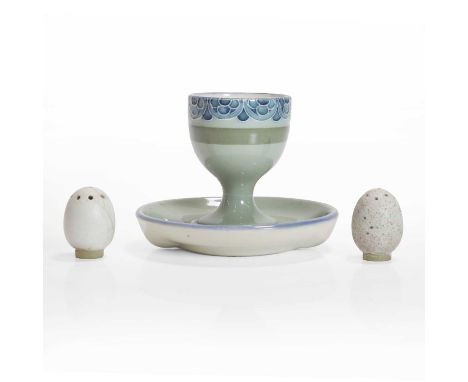 William Moorcroft (1872-1945), an egg cup, for James Macintyre &amp; Co., glazed earthenware, with printed factory stamp, gol