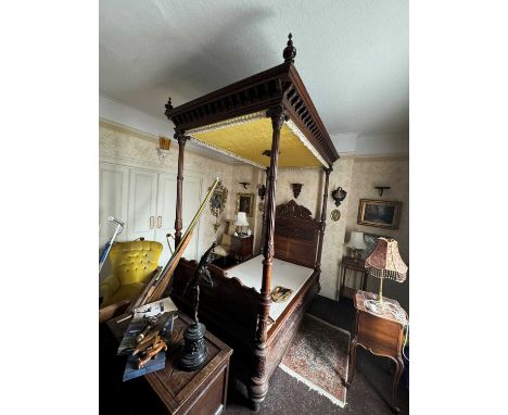 A carved oak four poster single bed, 19th/20th century,135cm wide 225cm deep252cm highCondition Reportthe bed is dismantled. 