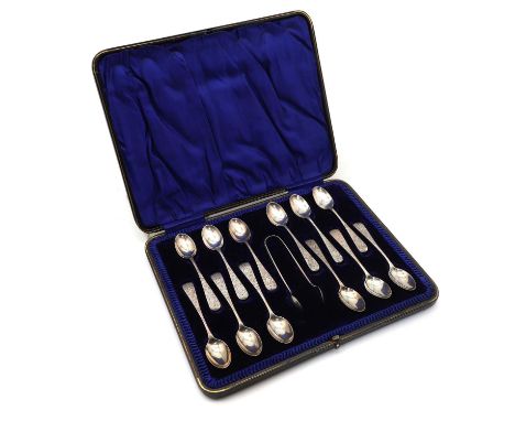 A cased set of silver teaspoons and sugar tongs,  by Henry Williamson Ltd., Sheffield 1905, with twelve teaspoons and a pair 