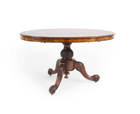 A Victorian and burr walnut low table, with a circular top, above a tripod base, terminating in scrolled feet,120cm wide190 c