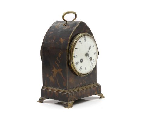 A tortoiseshell mantel clock  19th century, of lancet form, the 4inch white enamel dial with Roman numerals, moon hands and m