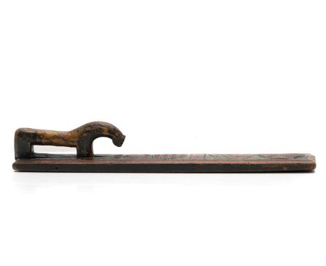 A Danish folk art painted hardwood mangle board, late 18th century to early 19th century, having painted and incised decorati