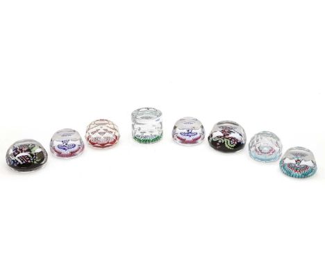 A group of eight Whitefriars glass paperweights,  mid-20th century, comprising a pair of Queen Elizabeth II commemorative exa