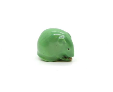 A Royal Worcester porcelain 'Netsuke',  early to mid 20th century, modelled as a mouse holding a nut, in a green glaze, with 