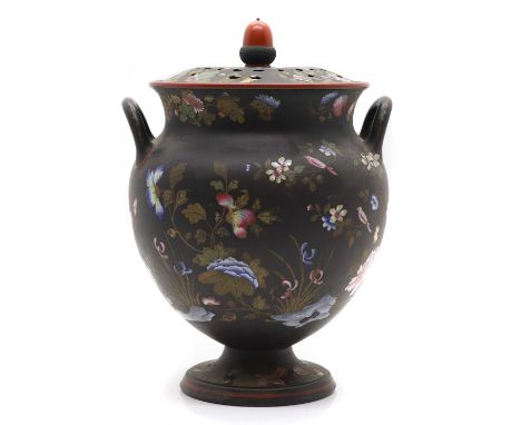 A Wedgwood black basalt potpourri vase and cover 19th century, of footed urn form, with a pierced cover with acorn finial ove