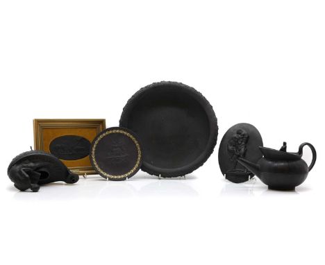 A collection of Wedgwood black basalt ware,  early 19th century and later, comprising, a teapot, with fluted decoration and f