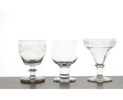 A group of twelve clear glass rummers, 20th century, possibly Dartington, 12.5cm high,together with five further engraved gla