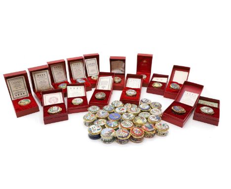 A collection of Halcyon Days enamel Christmas pill boxes,  1977-2010, including 15 with original boxes and certificates,  the