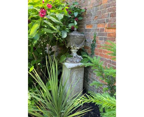 A reconstituted stone lidded urn on stand 20th century, in five parts, 40cm diameter138cm highCondition ReportWeathered and w