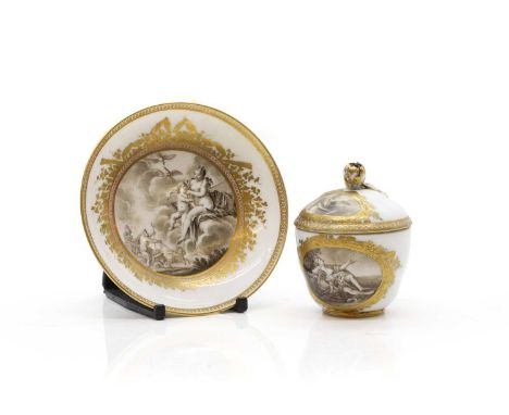 A Meissen porcelain cup and saucer late 18th to early 19th century, with en grisaille Classical scenes decoration, to gilt bo