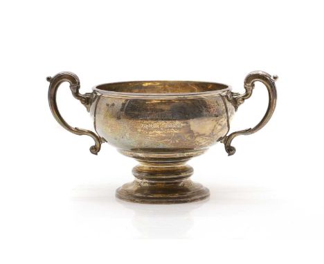 A silver twin-handled pedestal bowl by Adie Brothers, Birmingham 1928, engraved 'Jemima April 1928', 22cm wide12.5cm high9.5o