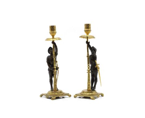 A pair of gilt metal figural candlesticks 20th century, a knight holding a sconce, 29.5cm high (2)Condition ReportOne missing