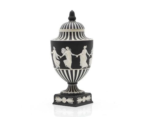 A Wedgwood 'Dancing Hours' jasperware urn 20th century, the upper section decorated with a single band of neoclassical maiden