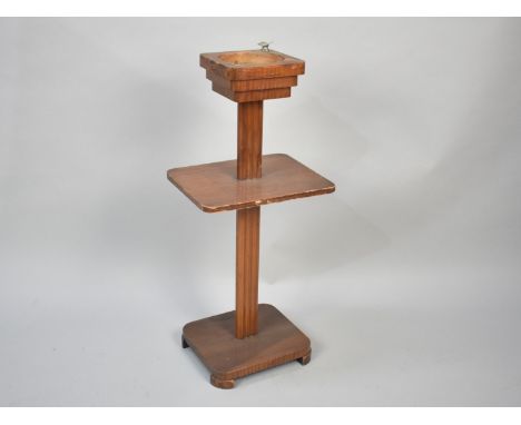 An Art Deco Smokers Stand with Centre Shelf, 63cm high (Missing Ashtray Bowl Liner)