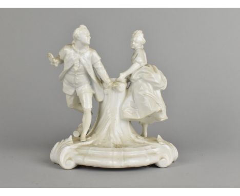 A German Porcelain Figural Candlestick, Formed as Trunk with Lovers Beside on Scrolled Base, 15cm high (Various Condition)