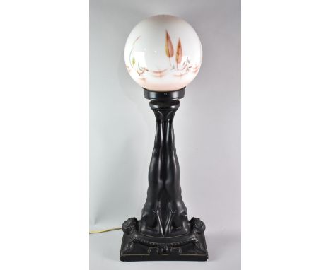 An Ebonised Plaster Art Deco Style Table Lamp Support in the Form of Two Back To Back Nudes on Cushion, Opaque Glass Ball Sha