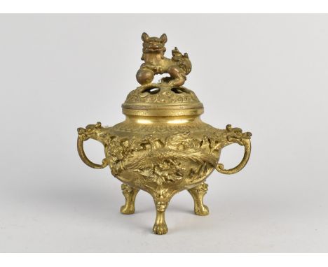 A Chinese Bronze Lidded Two Handled Sensor with Temple Lion Finial, Claw Feet, 13cms High