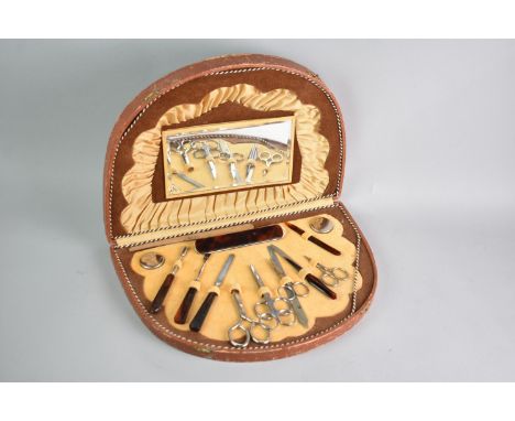 A Vintage Demilune Ladies Travelling Manicure Set, 32cms Wide