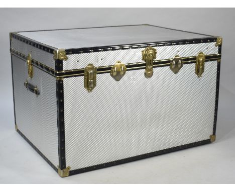 A Large Banded Aluminium Travelling Trunk, 99x76.5x63.5cm