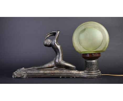 An Art Deco Bronzed Plaster Table Lamp, Probably French, with Green Glass Circular Shade, Reg. No 810821, 43cms Long (Various