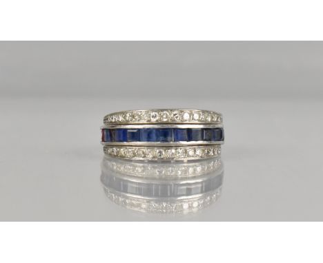 An Early 20th Century Diamond, Ruby and Sapphire 'Day and Night' Ring, Channel Set Square Cut Rubies Matched by Sapphires in 