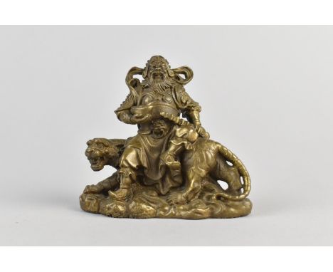 A Chinese Bronze Study of God of Wealth, Tsai Shen Yeh, Sitting on Tiger