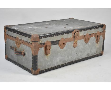A Vintage Metal Covered Travelling Trunk, 91cms Wide