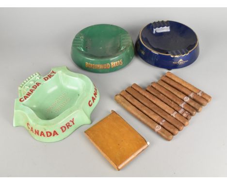A Collection of Nine Loose Monte Cristo Cigars, Wooden Cigarette Case Containing Cigarettes and Three Advertising Ashtrays