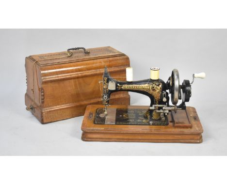 A Vintage Cased Frister and Rossmann Sewing Machine