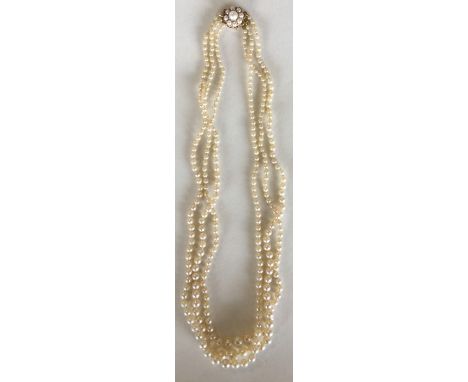 A good triple string of pearl beads with gold clasp. Est. £50 - £80.