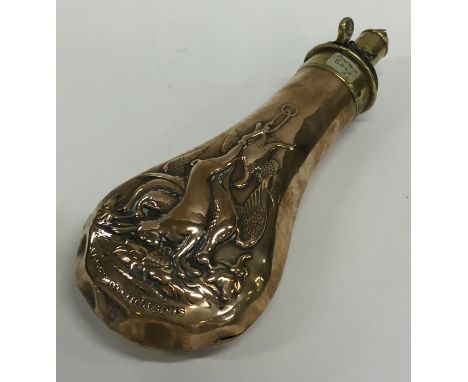 A copper shot flask decorated with animals. Est. £25 - £35.