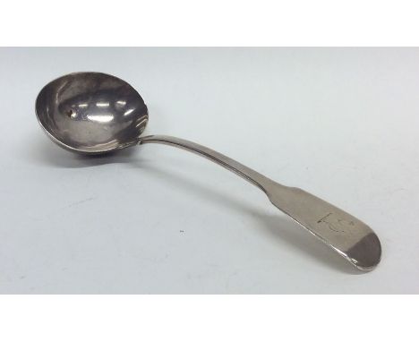 A fiddle pattern silver sauce ladle. London. Approx. 56 grams. Est. £20 - £30.