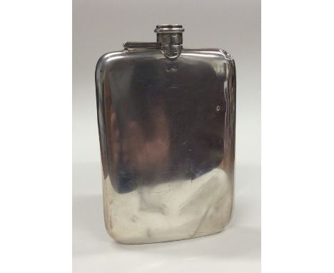 A massive silver hip flask with hinged top. Sheffield. By Walker &amp; Hall. Approx. 18 cms high. Approx. 287 grams. Est. £10