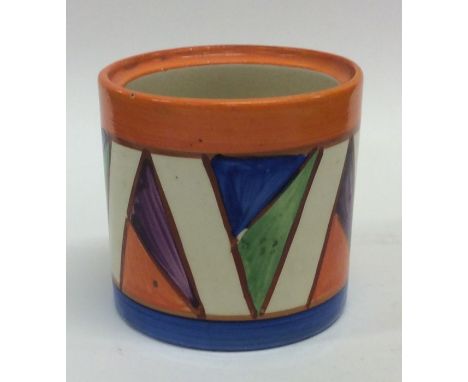 A Clarice Cliff 'Bizarre' pattern preserve bowl decorated with bright colours. Approx. 7.5 cms high. Est. £30 - £40.