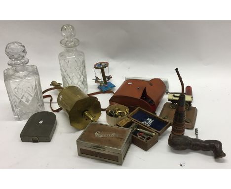 A box containing Parker pens, buttons, old brass scales, decanter etc. Est. £15 - £20.