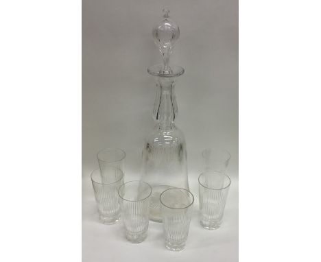 An etched glass decanter together with a set of six tapering glasses. Est. £25 - £35.