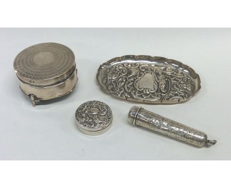 A small silver and engine turned ring box together with a bonbon dish, cheroot case etc. Approx. 153 grams. Est. £30 - £40.