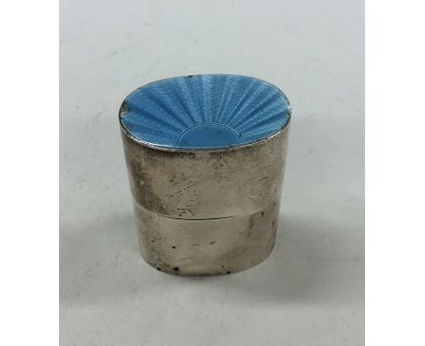 A good silver and enamelled slip top box with engine turned decoration. London. By FS Ltd. Approx. 116 grams. Est. £50 - £80.