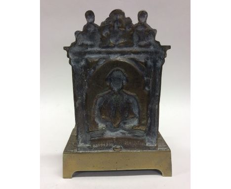 A novelty brass double inkwell on bracket feet. Approx. 20 cms high. Est. £20 - £30.