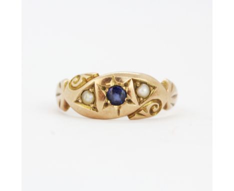 A 9ct yellow gold sapphire and seed pearl set ring, (O).