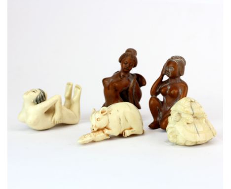 A group of Japanese carved fruitwood and bone netsuke, tallest 5cm.