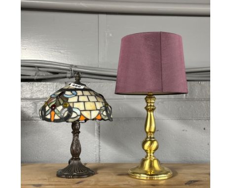 A small Tiffany style table lamp, H. 30cm, together with a gilt metal table lamp.