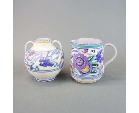 A large Poole pottery jug, H. 16cm, together with a two handled jar.