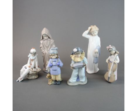 A group of six Nao porcelain figures, tallest 27cm.