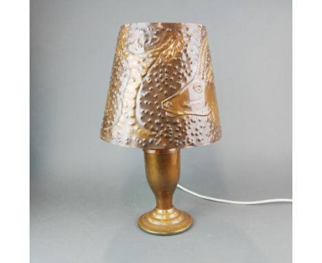 An arts and crafts hammered copper table lamp, H. 48cm.