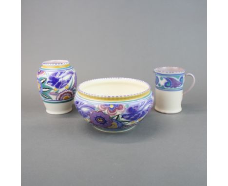 Three Poole pottery items, bowl dia. 20cm, vase H. 15cm.