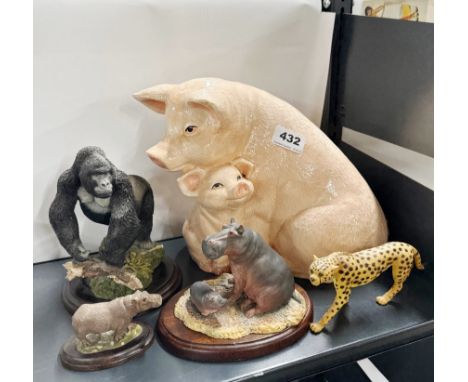 A large ceramic pig figure, H. 24cm, together with a group of resin animals