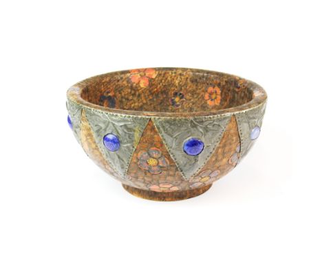 A 1920's Liberty style wooden fruit bowl with hammered pewter and ceramic bead overlay, dia. 26cm. One ceramic bead cracked.